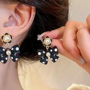 Chic Black and White Polka Dot Bow Earrings